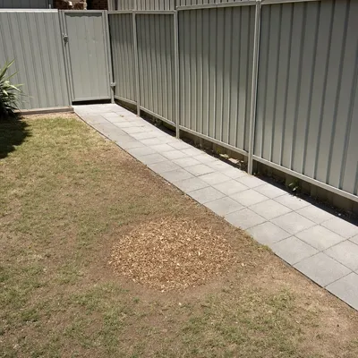 After: Stump grind after pine removal, sandy backyard, Mornington Peninsula
