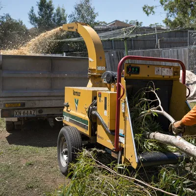 Mulching & Wood Chipping in Mornington Peninsula. On-site chipping of prunings and storm debris, plus bulk mulch delivery for garden beds and landscaping projects across the Peninsula.